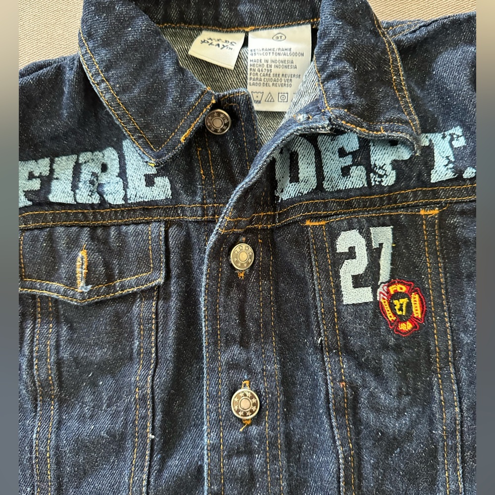 Denim dark wash toddlers jacket size 3t. Firefighter and number embellishments